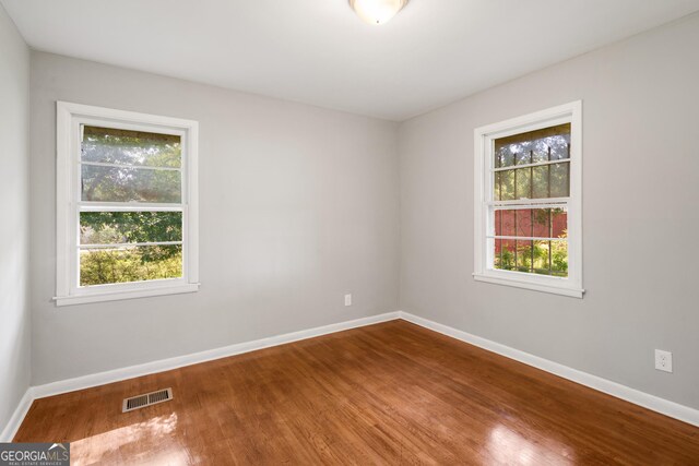 765 Shellnut Dr, Forest Park, GA 30297 - empty room featuring wood finished floors and baseboards