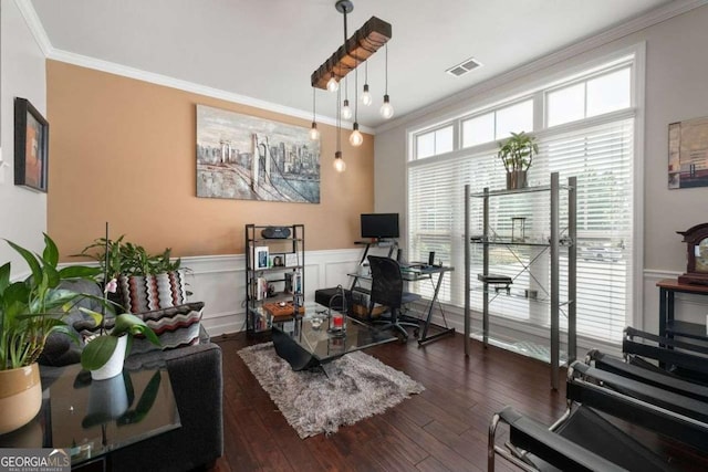 office area featuring crown molding, a wainscoted wall, and hardwood / wood-style flooring