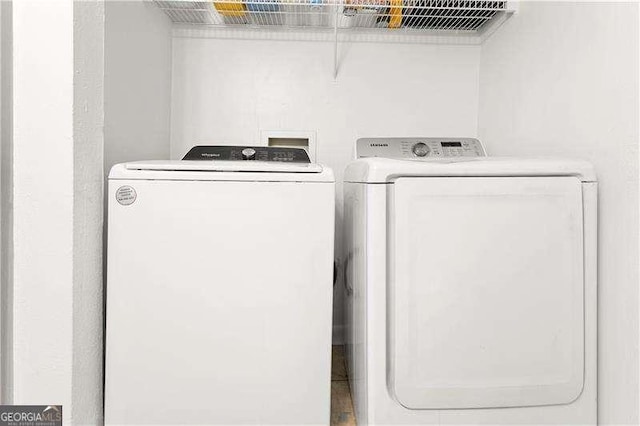 6900 Roswell Rd Unit 3N, Atlanta, GA 30328 - laundry room featuring washing machine and dryer