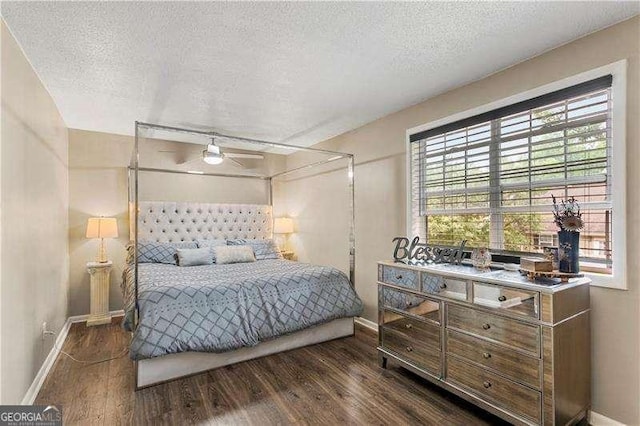 6900 Roswell Rd Unit 3N, Atlanta, GA 30328 - bedroom featuring baseboards, a textured ceiling, wood finished floors, and a ceiling fan