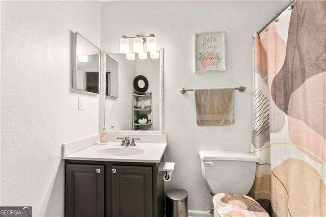 6900 Roswell Rd Unit 3N, Atlanta, GA 30328 - full bathroom with vanity and toilet