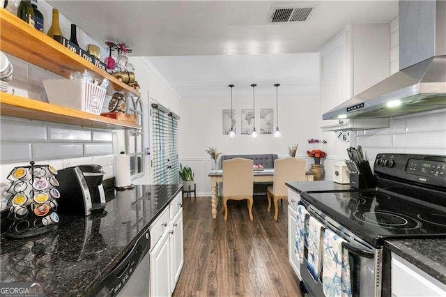 6900 Roswell Rd Unit 3N, Atlanta, GA 30328 - kitchen with electric range oven, wall chimney range hood, dark wood-style floors, dishwasher, and dark stone counters