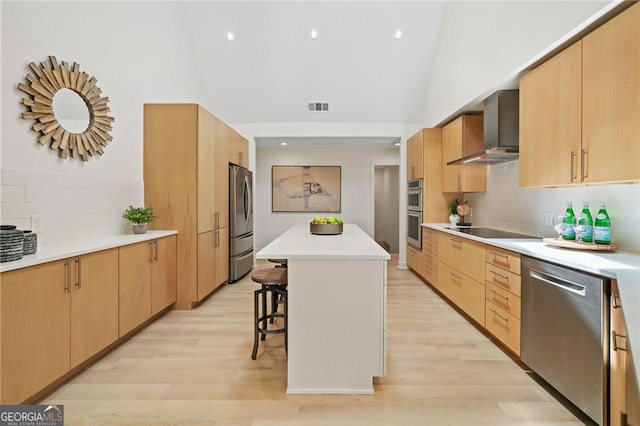 196 Mcelroy Mountain Dr, Jasper, GA 30143 - kitchen featuring wall chimney range hood, stainless steel appliances, a kitchen breakfast bar, a center island, and decorative backsplash