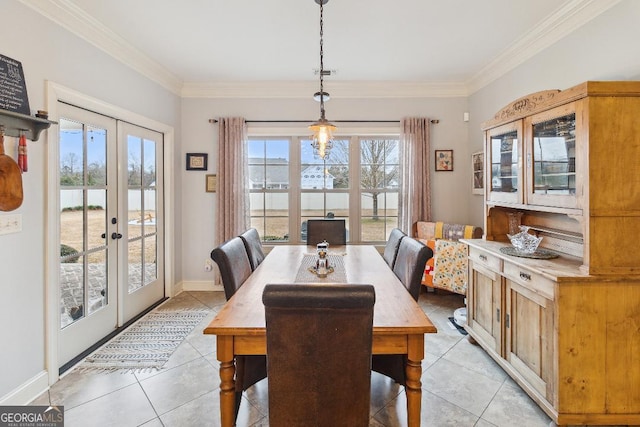 4 Honeysuckle Dr, Claxton, GA 30417 - dining area featuring french doors, light tile patterned floors, ornamental molding, baseboards, and a water view