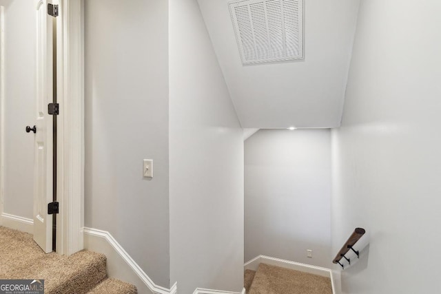 4 Honeysuckle Dr, Claxton, GA 30417 - staircase featuring carpet floors, baseboards, and vaulted ceiling