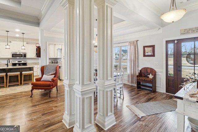 4 Honeysuckle Dr, Claxton, GA 30417 - entryway with crown molding, dark wood-type flooring, and decorative columns