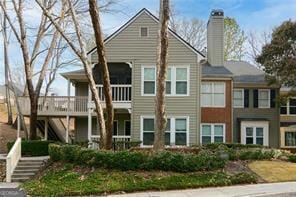 500 Bainbridge Dr, Atlanta, GA 30327 - view of front of home with stairs and a chimney