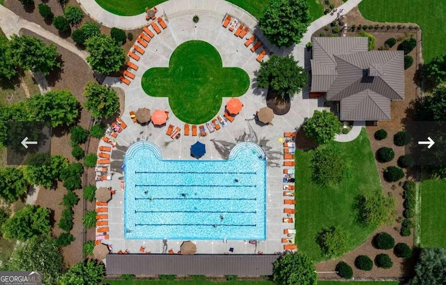 drone / aerial view of a pool area
