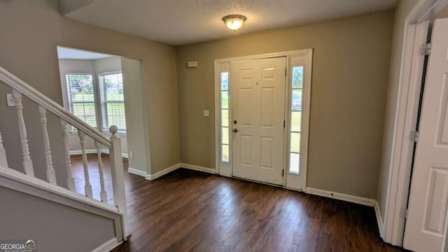 6231 Waterton Way, Lithonia, GA 30058 - entryway featuring stairway, baseboards, and wood finished floors