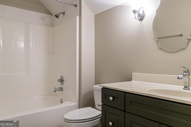 bathroom with toilet, shower / tub combination, and vanity