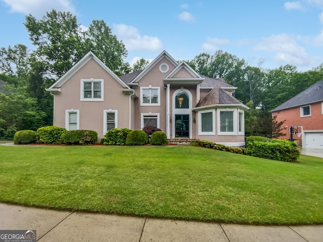 4345 Park Brooke Trce, Johns Creek, GA 30022 - view of front of home featuring stucco siding and a front lawn