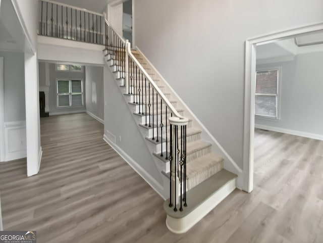 4345 Park Brooke Trce, Johns Creek, GA 30022 - stairs with wood finished floors