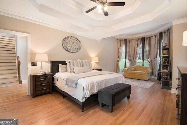 1640 Settindown Dr, Roswell, GA 30075 - bedroom featuring a tray ceiling, access to outside, light wood-style flooring, ornamental molding, and ceiling fan
