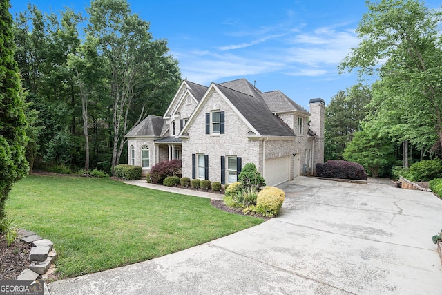 1640 Settindown Dr, Roswell, GA 30075 - view of front of home with concrete driveway, brick siding, a garage, a front yard, and a shingled roof