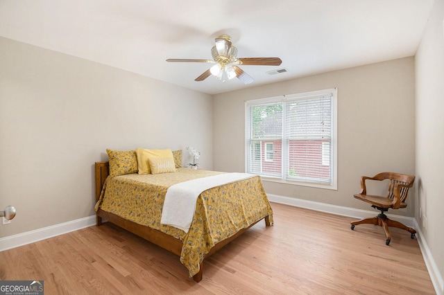 1640 Settindown Dr, Roswell, GA 30075 - bedroom featuring light wood finished floors, baseboards, and ceiling fan