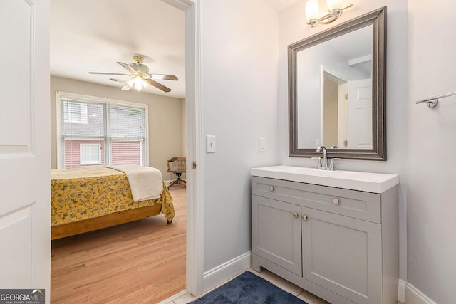 1640 Settindown Dr, Roswell, GA 30075 - bedroom featuring light wood finished floors and ceiling fan