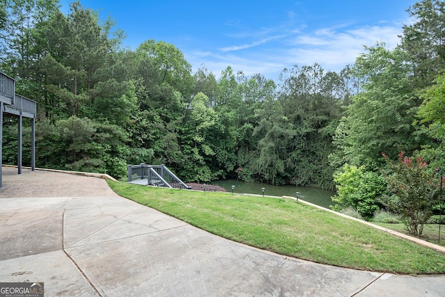 1640 Settindown Dr, Roswell, GA 30075 - view of green lawn featuring a water view