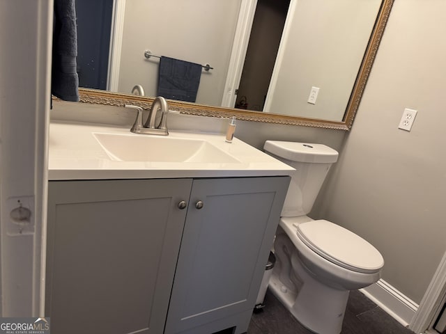 1640 Settindown Dr, Roswell, GA 30075 - half bathroom featuring vanity and tile patterned flooring