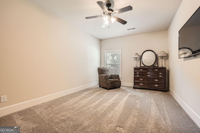 349 Pennant Ln, Fairburn, GA 30213 - sitting room featuring a ceiling fan, carpet flooring, and baseboards