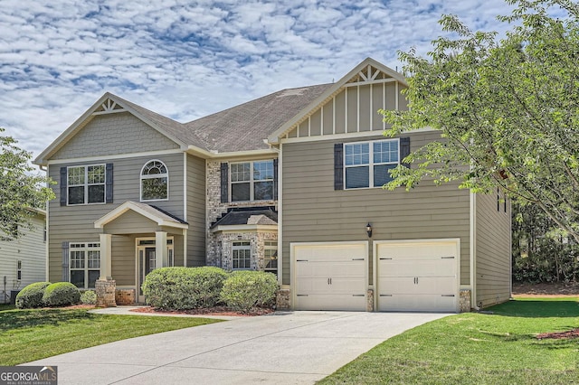 349 Pennant Ln, Fairburn, GA 30213 - craftsman house featuring concrete driveway, a front yard, stone siding, an attached garage, and board and batten siding