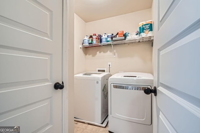 349 Pennant Ln, Fairburn, GA 30213 - clothes washing area with washer and dryer