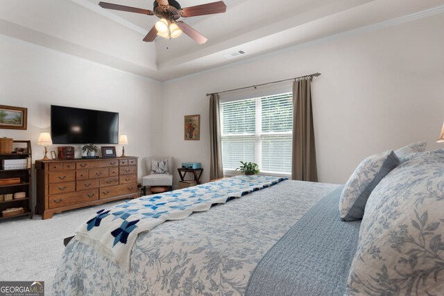 bedroom with ornamental molding, light carpet, and a ceiling fan