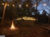 446 Mcmurray Lake Rd, Toccoa, GA 30577 - view of yard with an outdoor fire pit