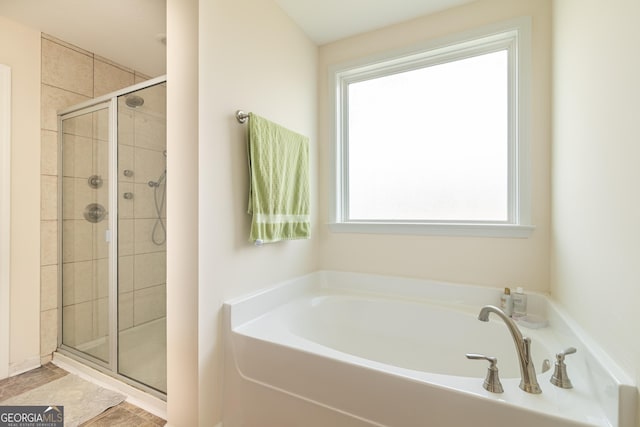 7155 Pine Seed Dr, Midland, GA 31820 - bathroom featuring a shower stall and a bath