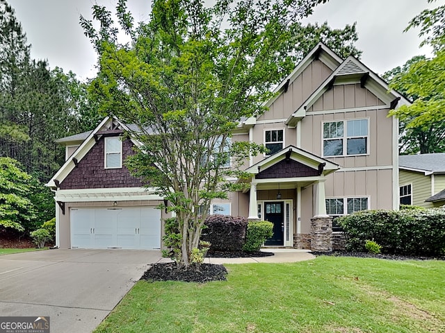 330 Bentleigh Station Dr, Acworth, GA 30101 - craftsman-style house with board and batten siding, concrete driveway, a garage, and a front lawn