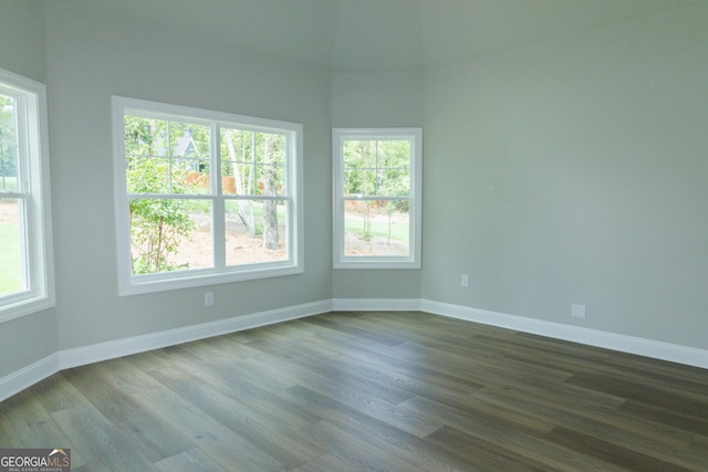 214 Wet Wood Ct Unit 26, Fairburn, GA 30213 - spare room featuring dark wood-type flooring and baseboards