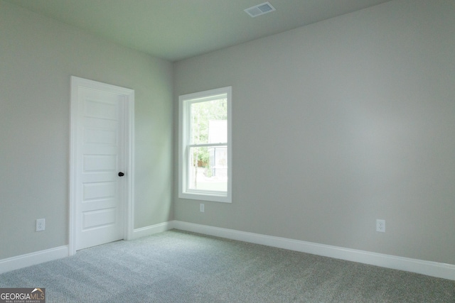 214 Wet Wood Ct Unit 26, Fairburn, GA 30213 - carpeted spare room featuring baseboards