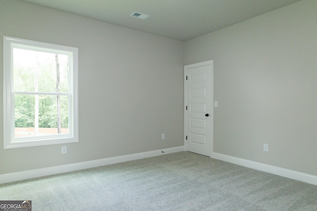 214 Wet Wood Ct Unit 26, Fairburn, GA 30213 - carpeted spare room with baseboards