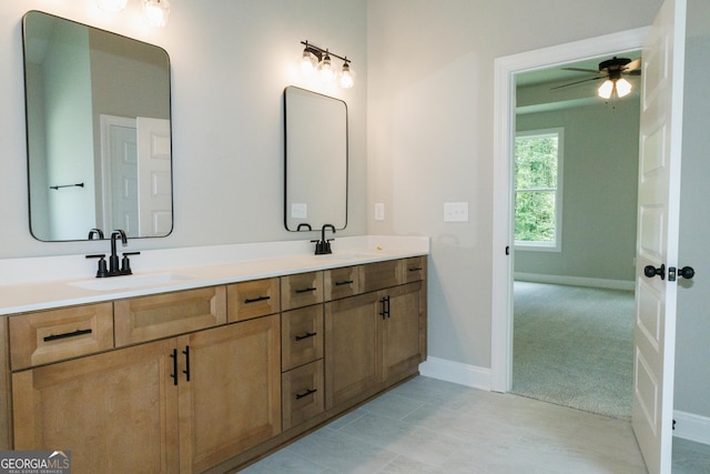214 Wet Wood Ct Unit 26, Fairburn, GA 30213 - bathroom featuring double vanity, baseboards, and ceiling fan