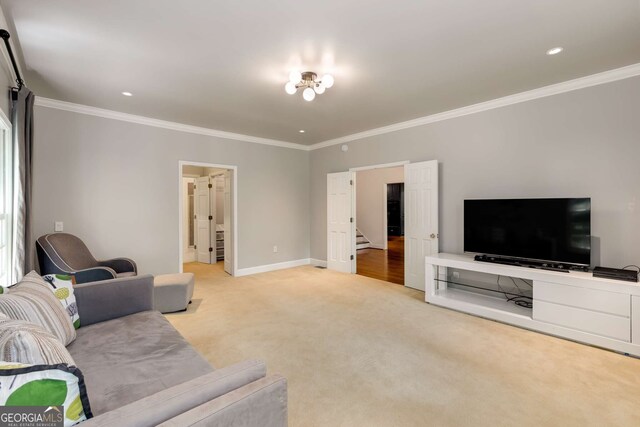 130 River Lndg NE, Sandy Springs, GA 30350 - living area featuring crown molding, light colored carpet, baseboards, and stairs