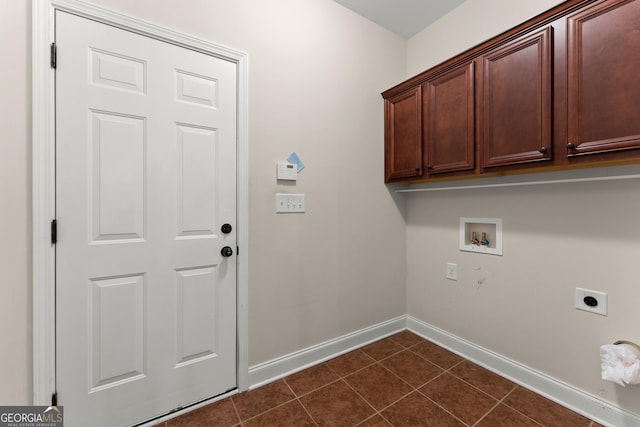 4633 Hidden Creek Dr, Gainesville, GA 30504 - washroom with hookup for an electric dryer, cabinet space, baseboards, washer hookup, and dark tile patterned flooring
