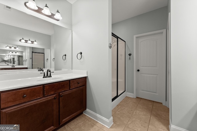 4633 Hidden Creek Dr, Gainesville, GA 30504 - full bath with a shower stall, vanity, tile patterned floors, and baseboards
