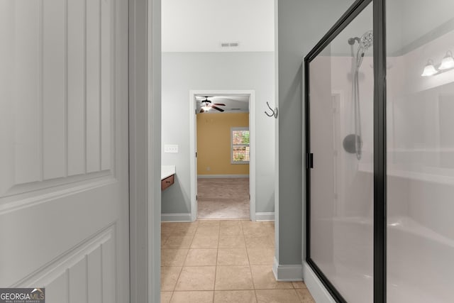 4633 Hidden Creek Dr, Gainesville, GA 30504 - bathroom with a stall shower, tile patterned flooring, vanity, baseboards, and ceiling fan