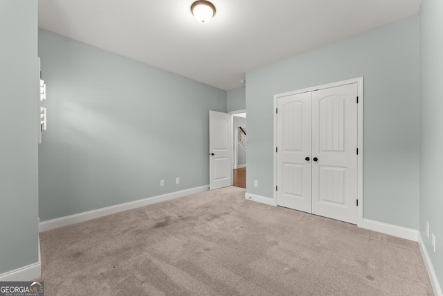 4633 Hidden Creek Dr, Gainesville, GA 30504 - unfurnished bedroom with carpet flooring, a closet, and baseboards