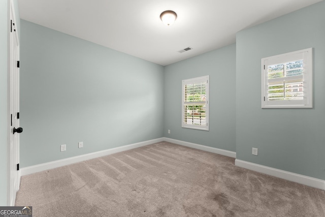 4633 Hidden Creek Dr, Gainesville, GA 30504 - carpeted spare room featuring healthy amount of natural light and baseboards
