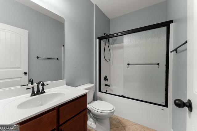 4633 Hidden Creek Dr, Gainesville, GA 30504 - bathroom with toilet, vanity, bath / shower combo with glass door, and tile patterned flooring