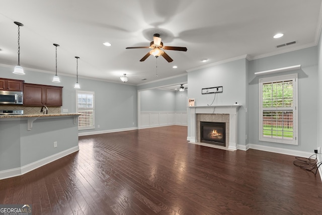 4633 Hidden Creek Dr, Gainesville, GA 30504 - unfurnished living room featuring a ceiling fan, a fireplace, dark wood finished floors, ornamental molding, and recessed lighting
