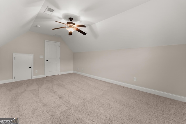 4633 Hidden Creek Dr, Gainesville, GA 30504 - additional living space with ceiling fan, light carpet, vaulted ceiling, and baseboards