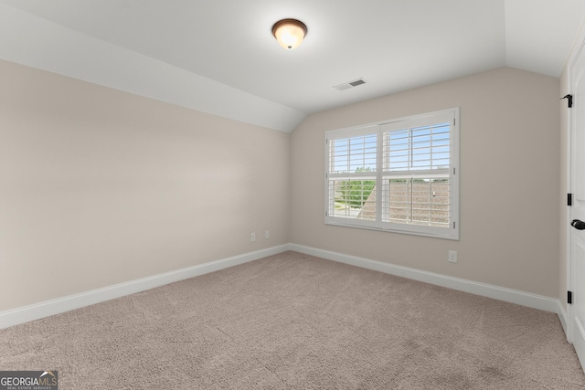 4633 Hidden Creek Dr, Gainesville, GA 30504 - spare room with lofted ceiling, carpet floors, and baseboards