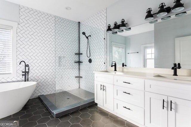 569 Hope St SW, Atlanta, GA 30310 - full bathroom featuring a tile shower, tile patterned flooring, a soaking tub, and double vanity