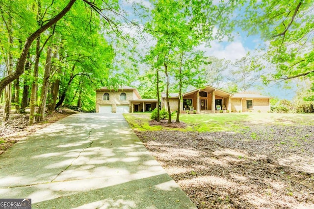 2228 Walker Dr, Lawrenceville, GA 30043 - view of front of home featuring a garage and driveway