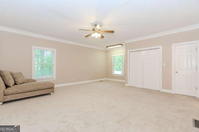 2228 Walker Dr, Lawrenceville, GA 30043 - sitting room featuring ornamental molding, light carpet, ceiling fan, and baseboards