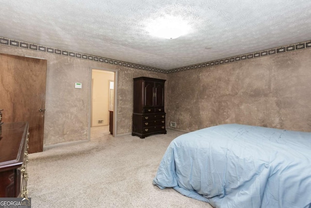 2228 Walker Dr, Lawrenceville, GA 30043 - bedroom featuring a textured ceiling and carpet