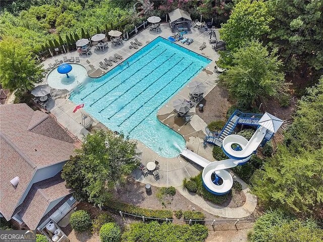 drone / aerial view of a pool area