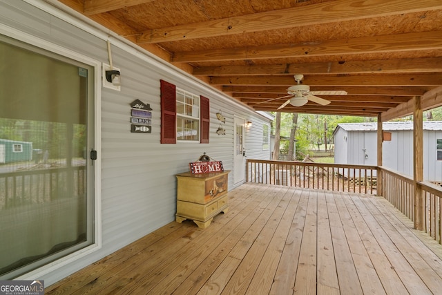 194 Phillips Dr, Eatonton, GA 31024 - deck featuring a shed and an outbuilding