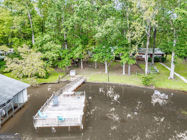 194 Phillips Dr, Eatonton, GA 31024 - dock featuring view of wooded area and a water view
